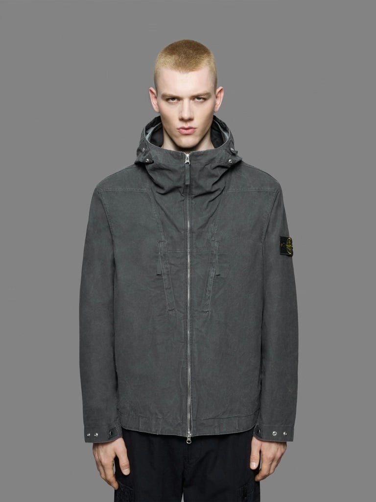Stone Island tela resinata No Seasons jacket worn by a model