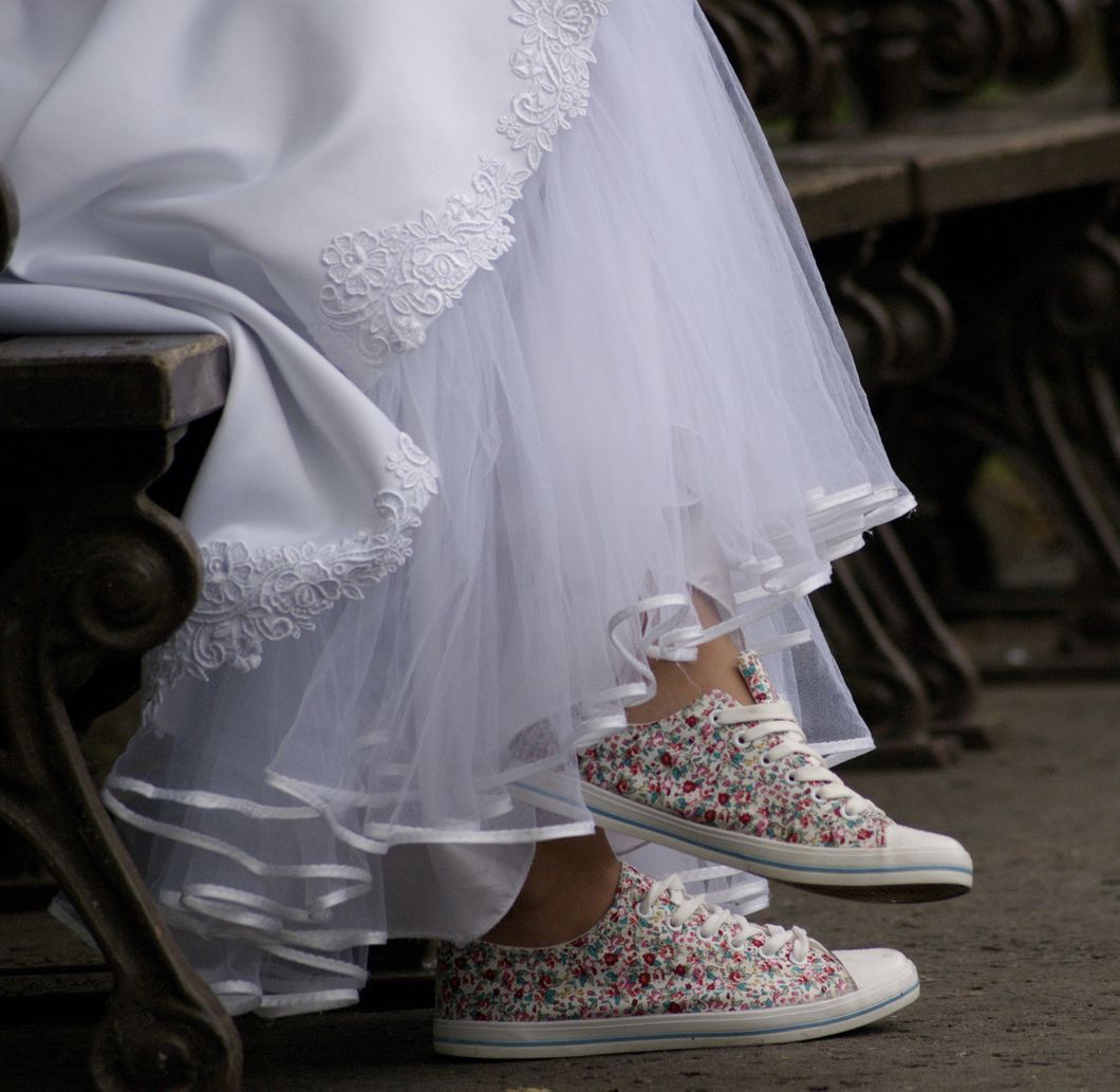 bride wearing converse